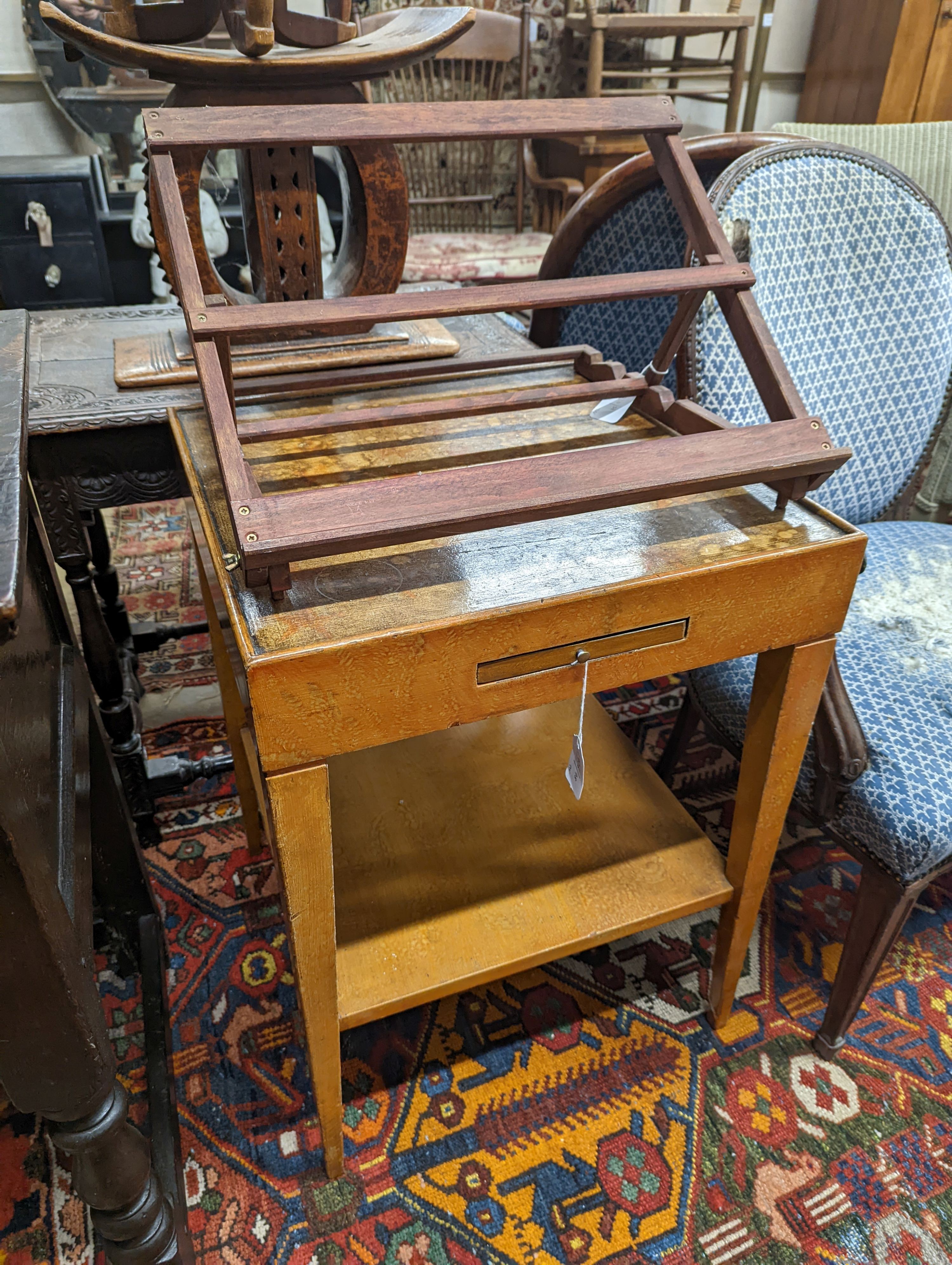 A 20th century two-tier table with scumbled finish, width 51cm, depth 51cm, height 68cm together with a table top adjustable easel